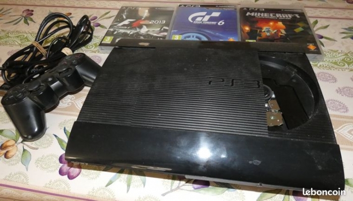 Photo PlayStation3 1 To + 3 jeux + Volant de course offert 560