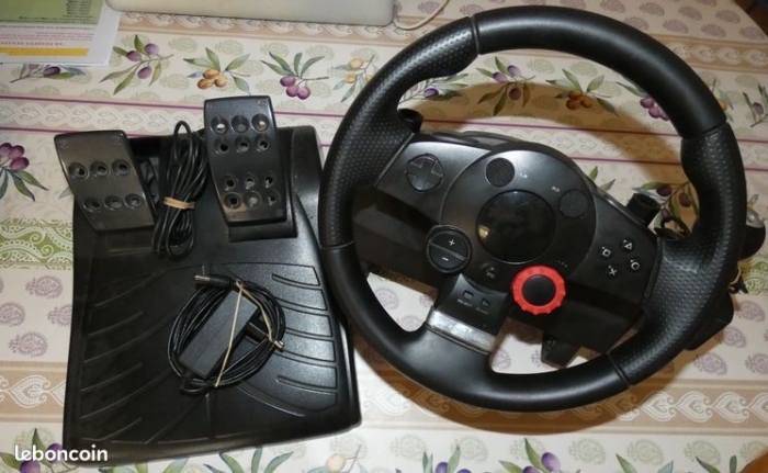 Photo PlayStation3 1 To + 3 jeux + Volant de course offert 560